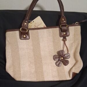 Relic Tan and Brown Tote with Floral Charm NWT Has Minor Wear Stains From Storag